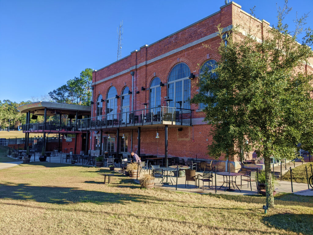 Brick industrial-chic building housing The Edison restaurant and the Power Plant Cafe